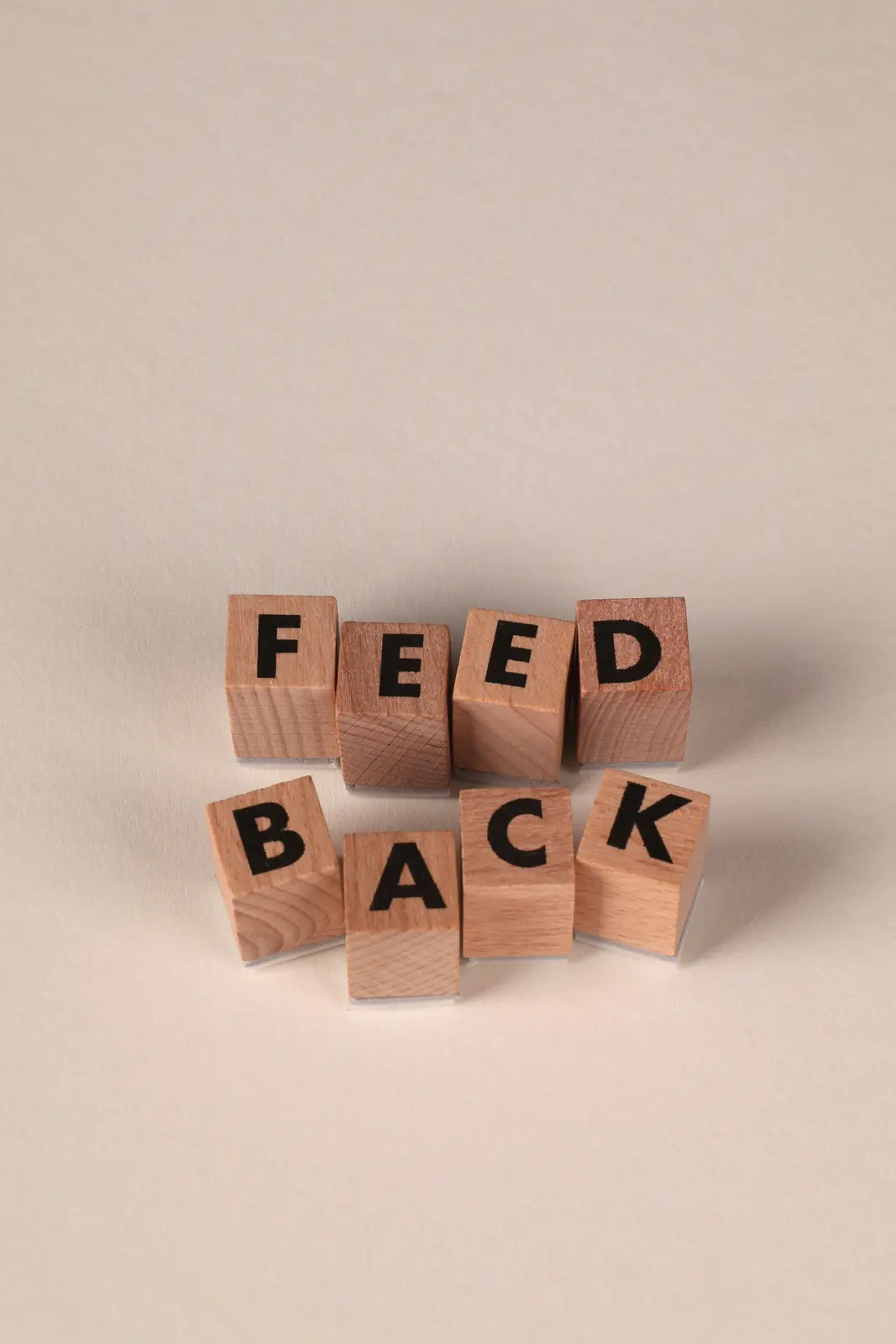Wooden cubes spelling the word feedback